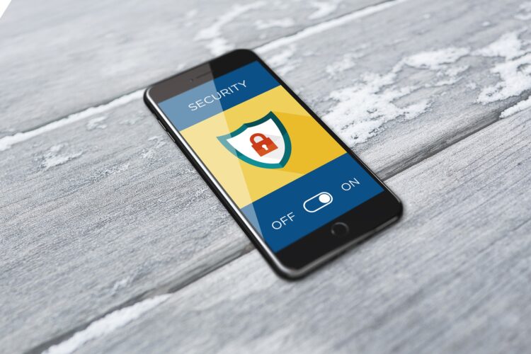 A person using an Android smartphone, illustrating fake APK fraud in India